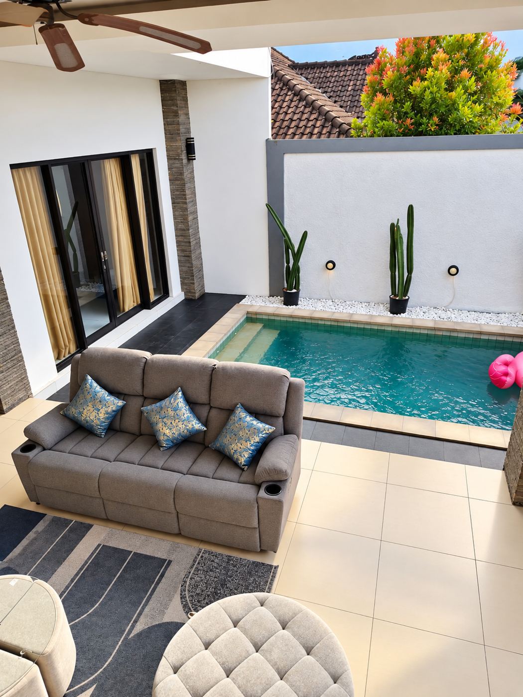 Open-plan living room opening onto the private plunge pool